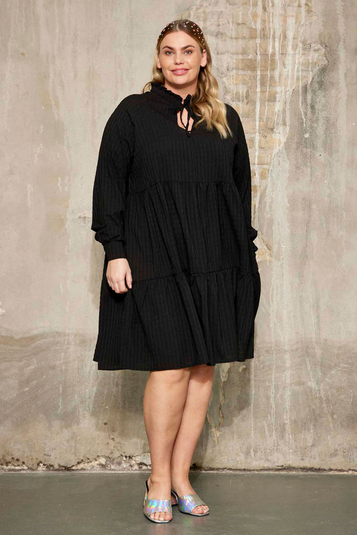 Black long-sleeved dress. Shop plus size clothing for women who love their curves | Anyday
